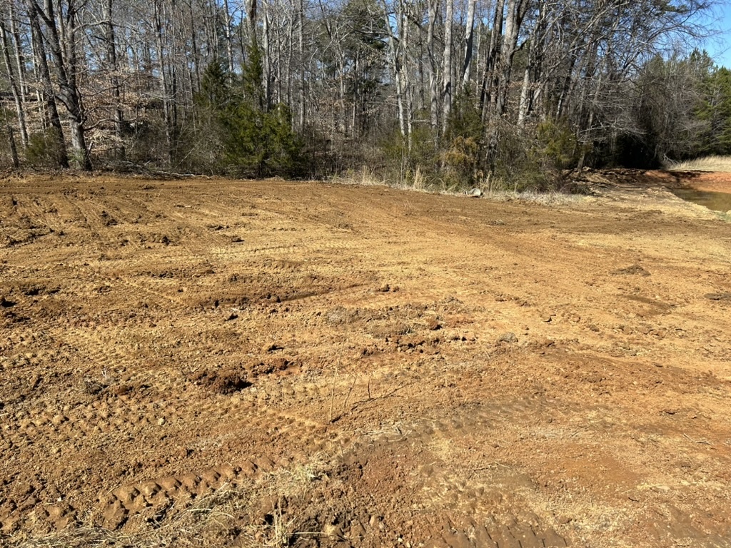 Cleared dirt lot construction site graded land